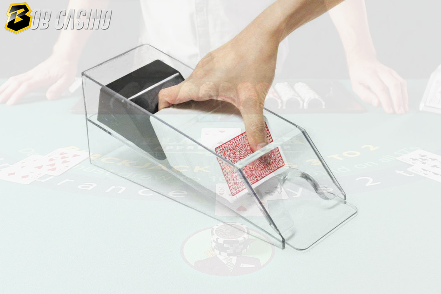 A plastic discard tray holding deck of cards on casino table