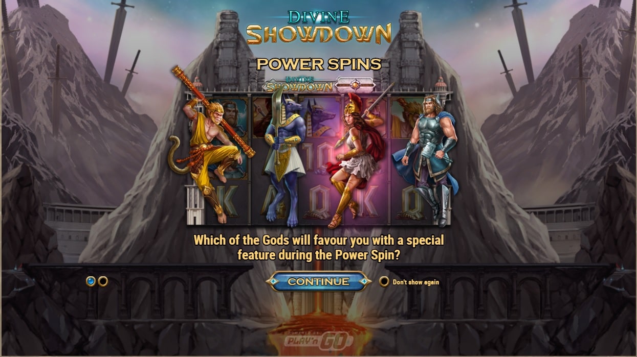 Wukong, Anubis, Athena and Thor standing in front of a mountain in the Divine Showdown slot.