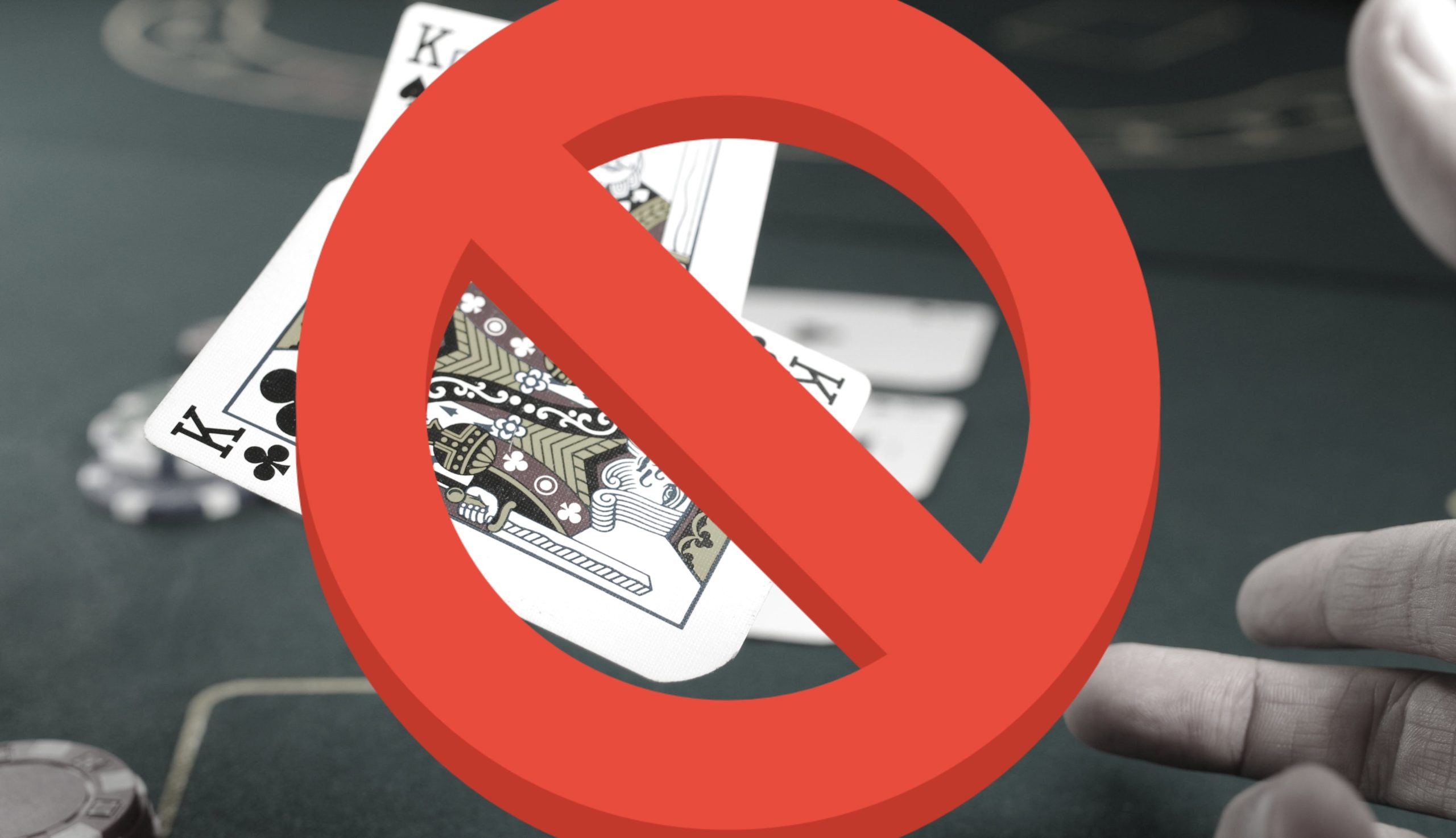 A person playing poker crossed out, as VIP gambling in UK might be banned