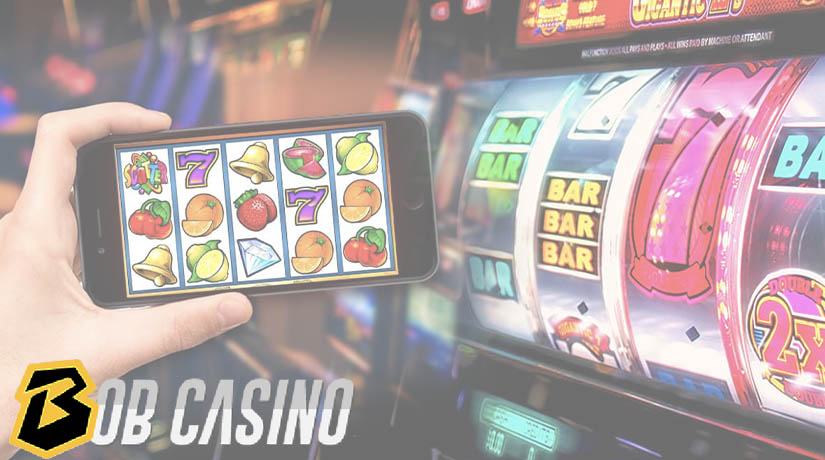 Online slots on mobile near the mechanical slot reels.